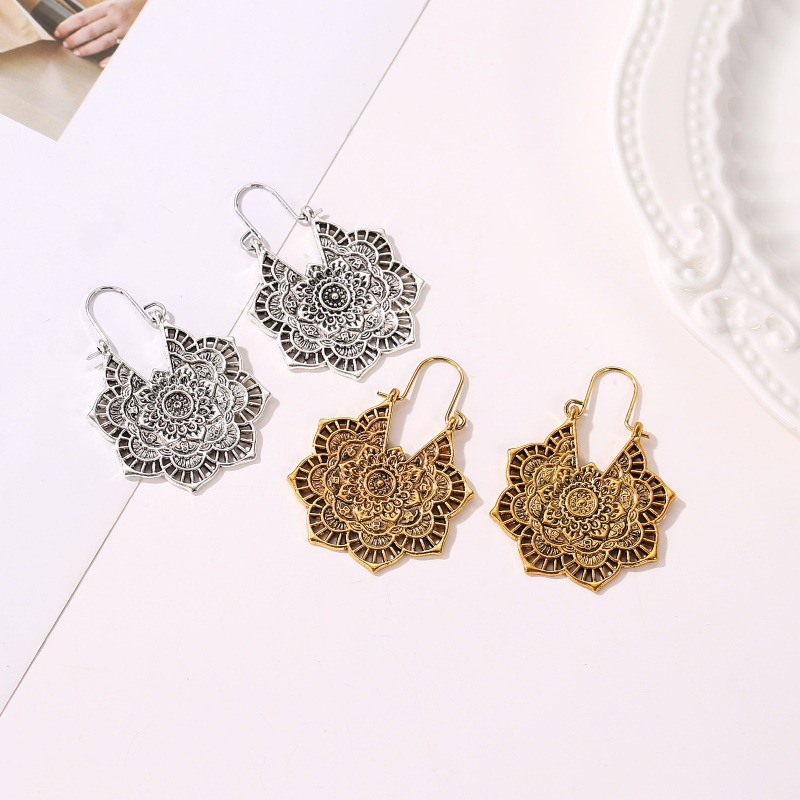 Ethnic Style Earrings Exotic Flavor Metal Hollow Flower Earrings Bohemian Carved Palace Style Ear Drops
