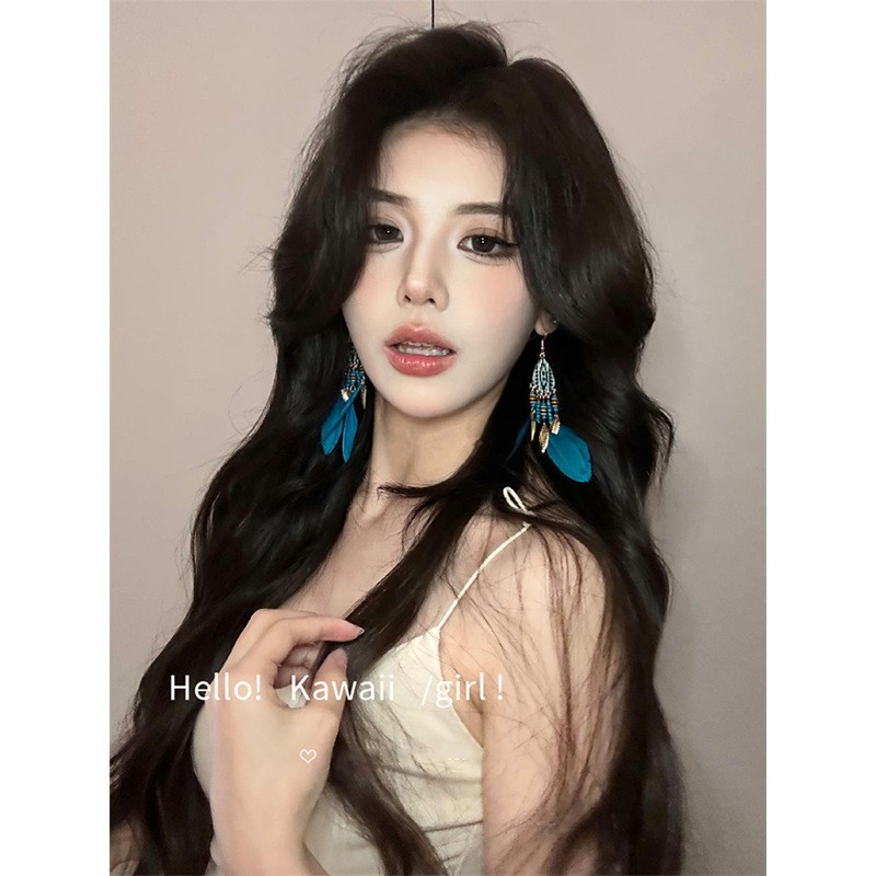 Ethnic style red bead tassel Bohemian earrings Yunnan travel resort style ear cuff feather ear accessories