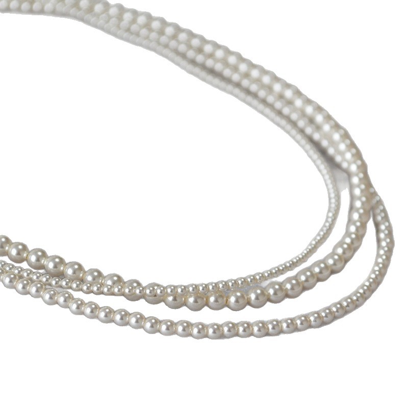 Round high-gloss pearl necklace for women elegant 2026 autumn winter new yuanbao buckle silver accessories
