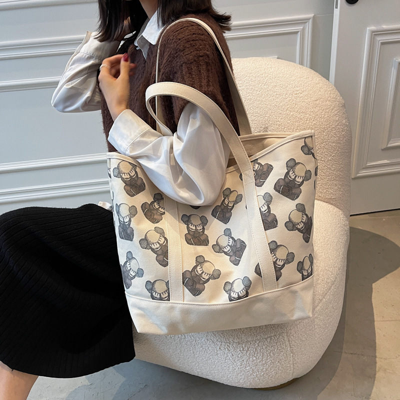 Fitting room shoulder bag canvas bag niche tote bag large capacity student class KAWS handbag