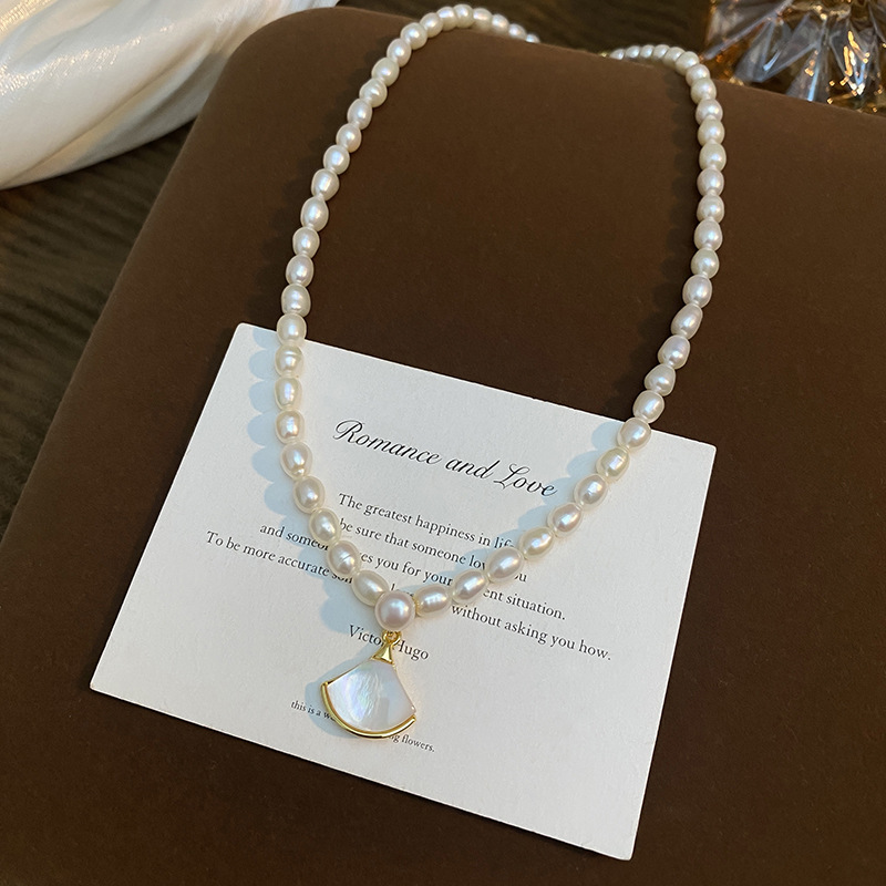 Natural pearl necklace for women, elegant collarbone chain with small rice pearls, vintage style