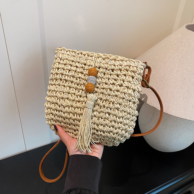 Woven hollow bag women 2024 spring summer new straw woven shoulder crossbody casual bag vacation bag