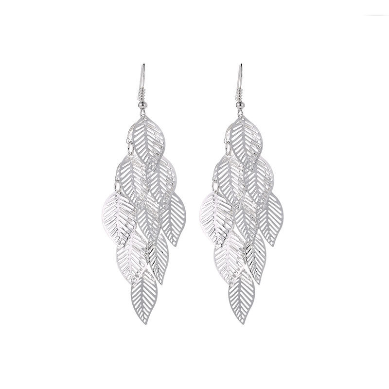 Ethnic Style Earrings Exotic Flavor Metal Hollow Flower Earrings Bohemian Carved Palace Style Ear Drops