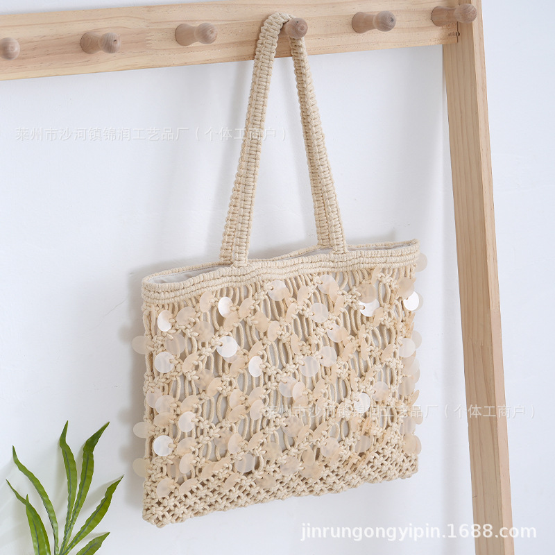 New vacation style shell piece woven beige tote bag, large capacity hollow woven shoulder bag
