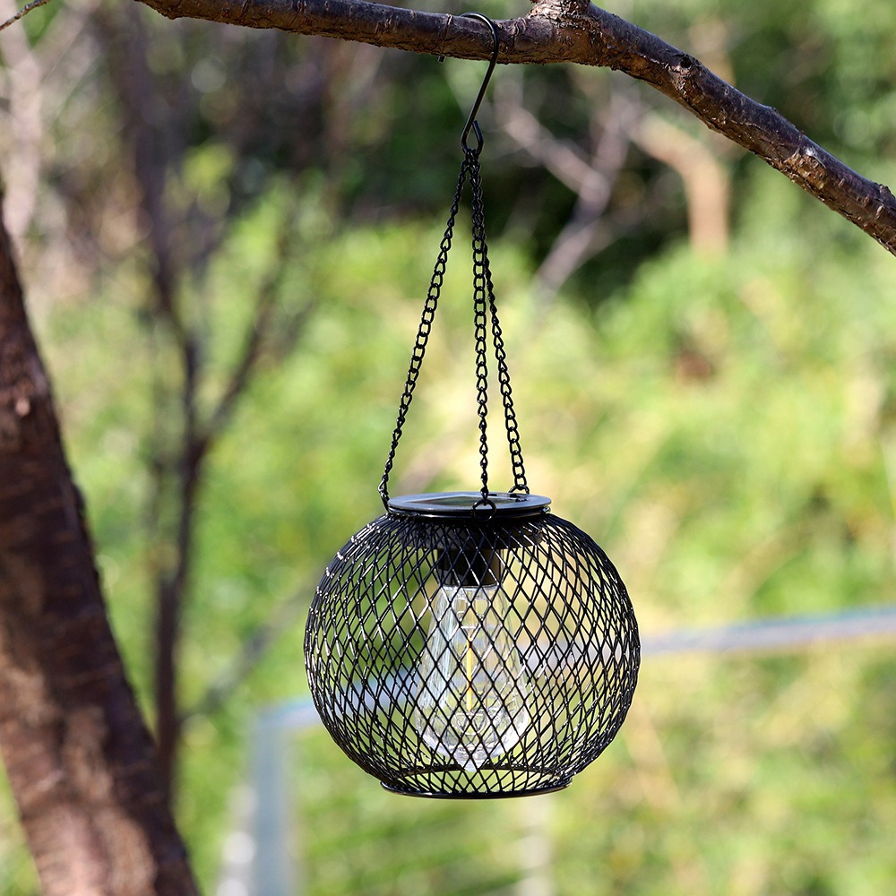 2026 new solar outdoor courtyard lamp iron lantern outdoor hollow waterproof garden landscape decoration