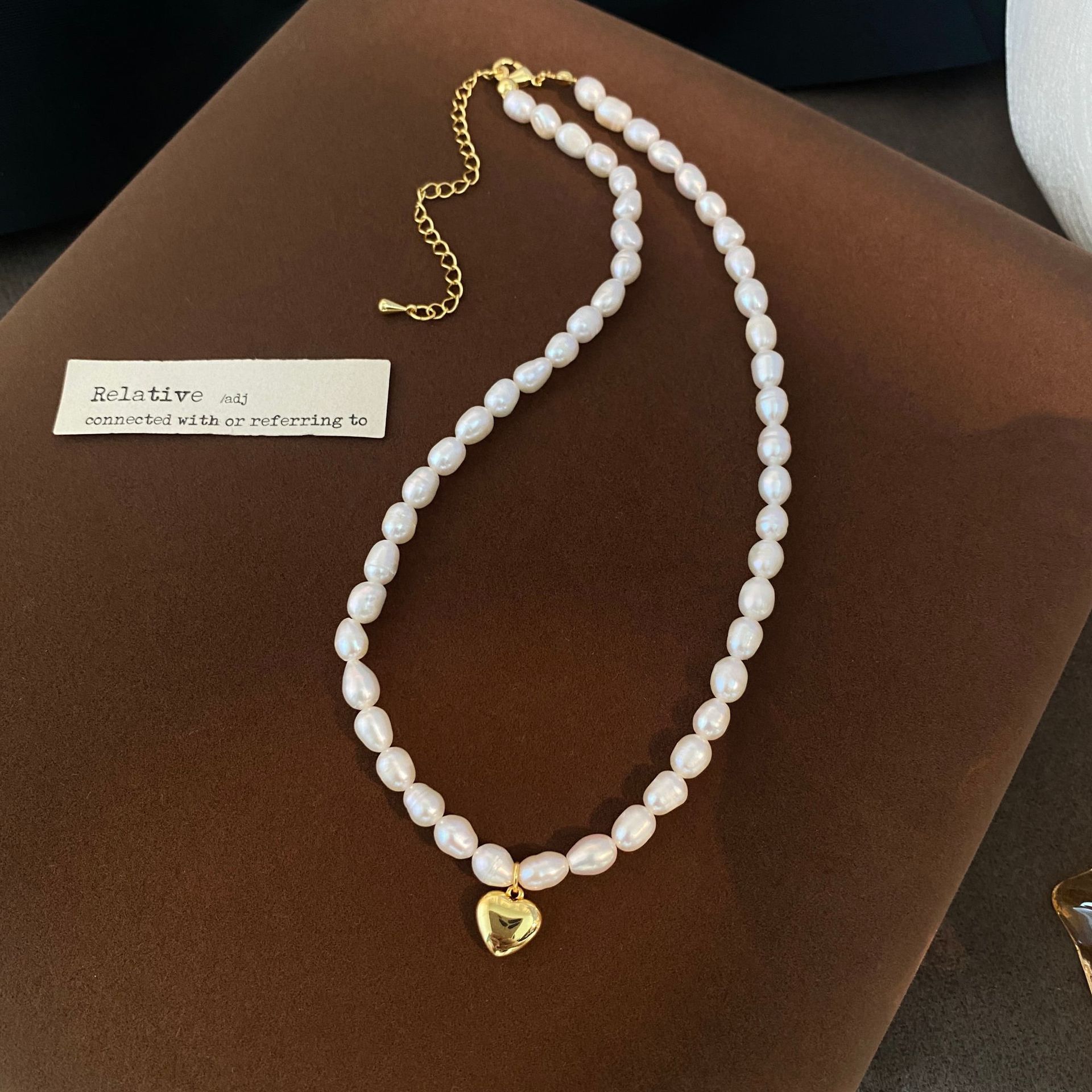 Natural pearl necklace for women, elegant collarbone chain with small rice pearls, vintage style