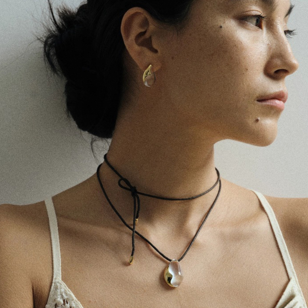 Dong Jie white crystal earrings and necklace, elegant drop pendant, delicate sweater chain