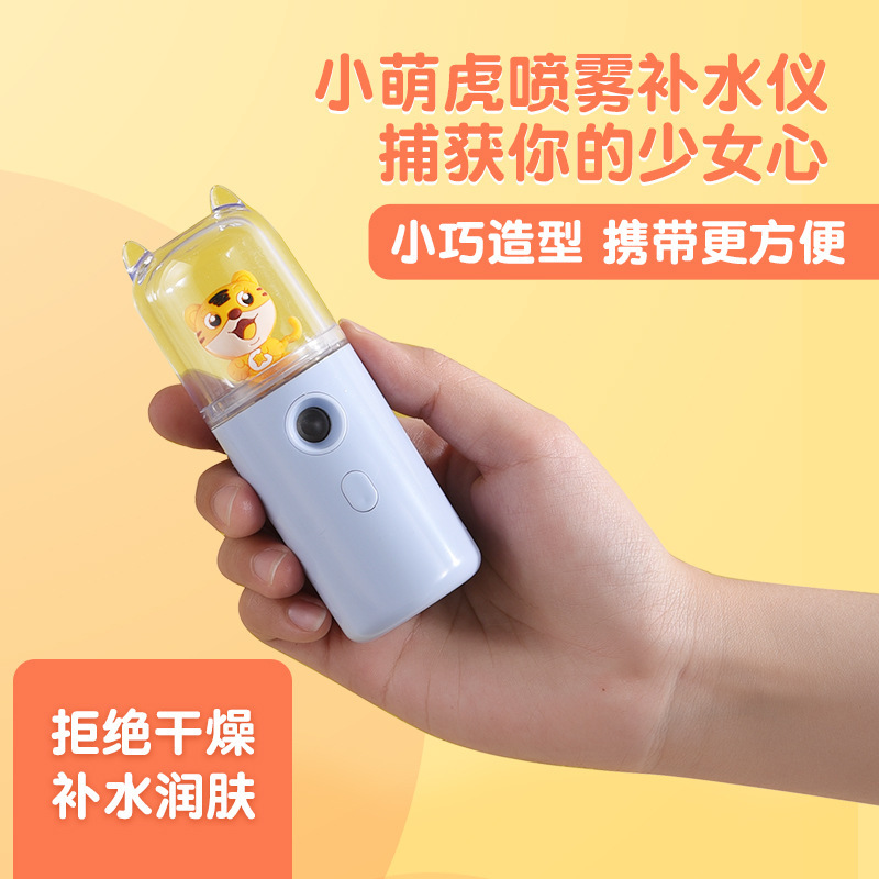 New spray hydrating device portable handheld face humidifier small hydrating spray beauty device alcohol disinfection