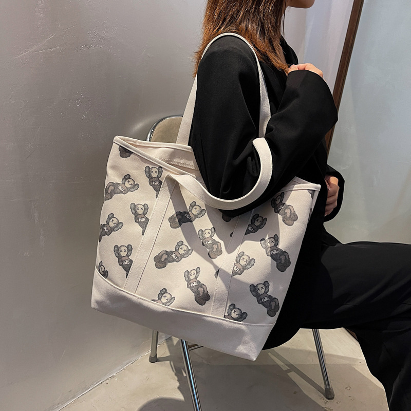 Fitting room shoulder bag canvas bag niche tote bag large capacity student class KAWS handbag