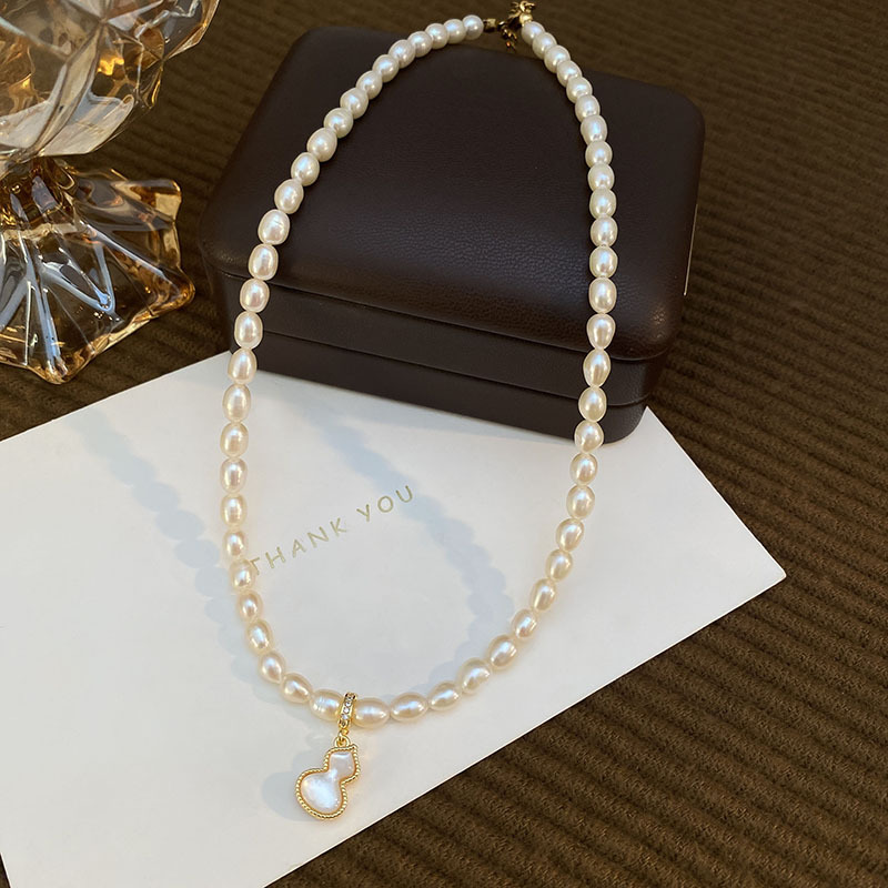 Natural pearl necklace for women, elegant collarbone chain with small rice pearls, vintage style