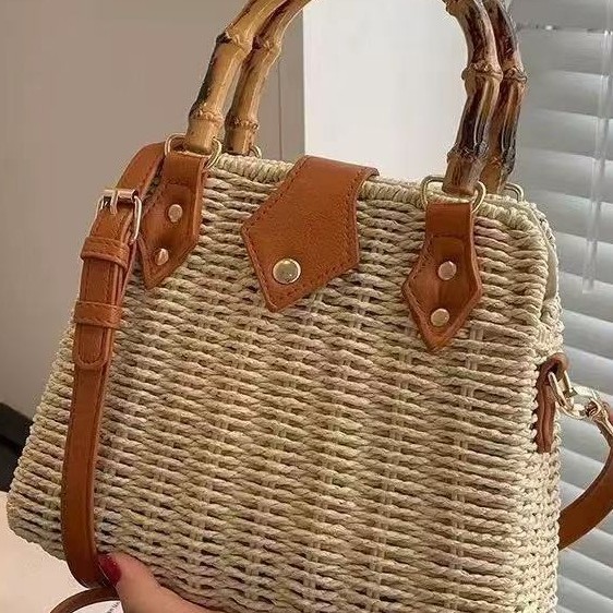 Pastoral style straw bag new shoulder hand two-use bamboo handle women's commuting woven bag