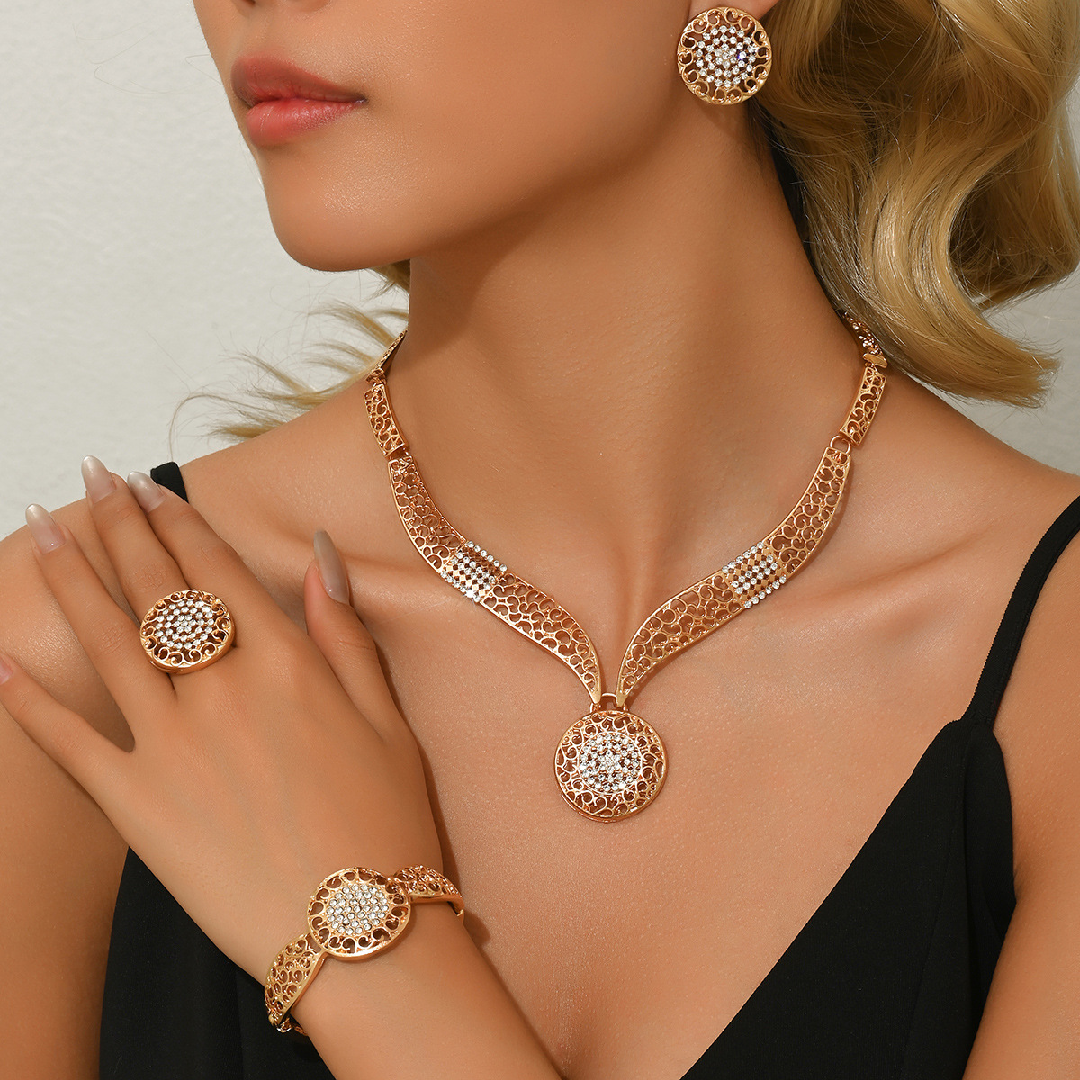 Gold Alloy Hollow Necklace Earrings Bracelet Ring Four-Piece Wedding Banquet Accessories
