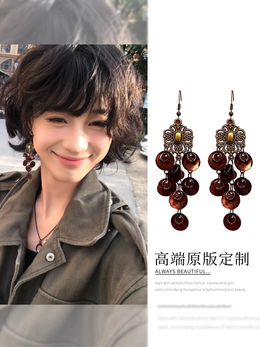 Ethnic style red bead tassel Bohemian earrings Yunnan travel resort style ear cuff feather ear accessories