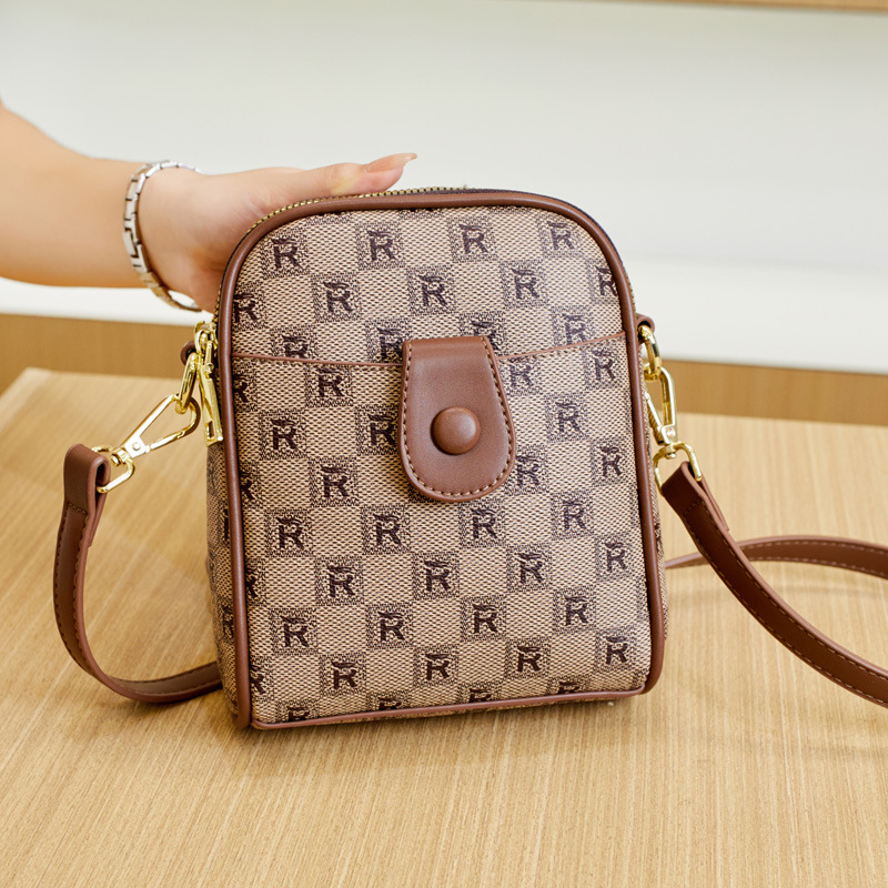 Genuine leather small crossbody bag 2026 new multi-layer phone bag women's color-block crossbody bag mini small bag