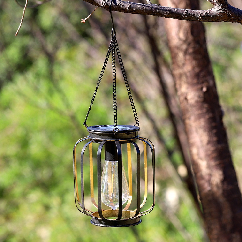 2026 new solar outdoor courtyard lamp iron lantern outdoor hollow waterproof garden landscape decoration