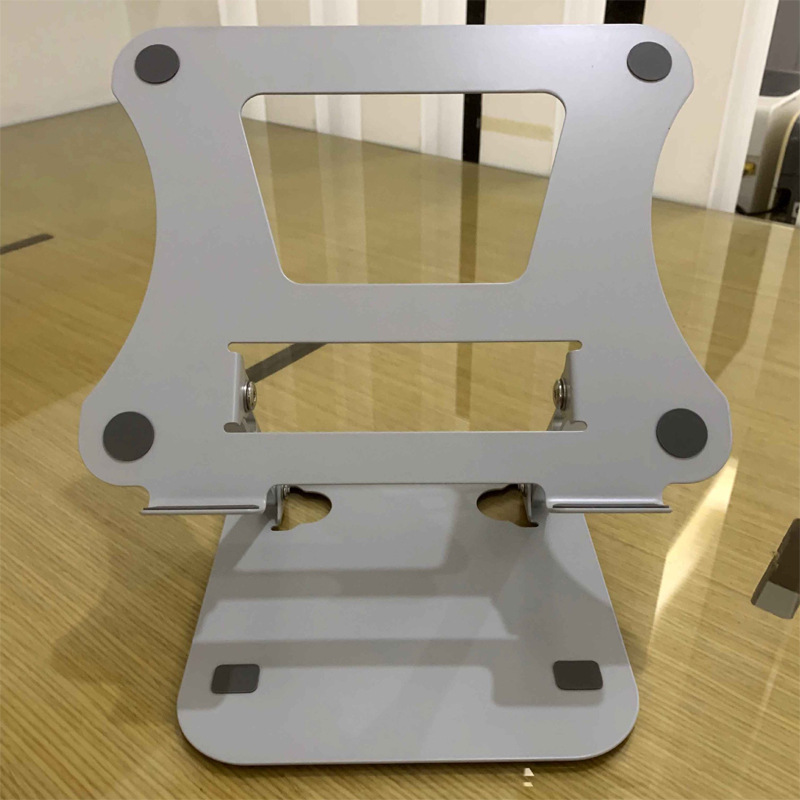 New metal computer stand notebook tablet vertical stand adjustable folding portable stand hollow heat dissipation