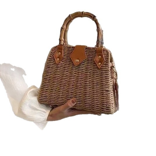 Pastoral style straw bag new shoulder hand two-use bamboo handle women's commuting woven bag