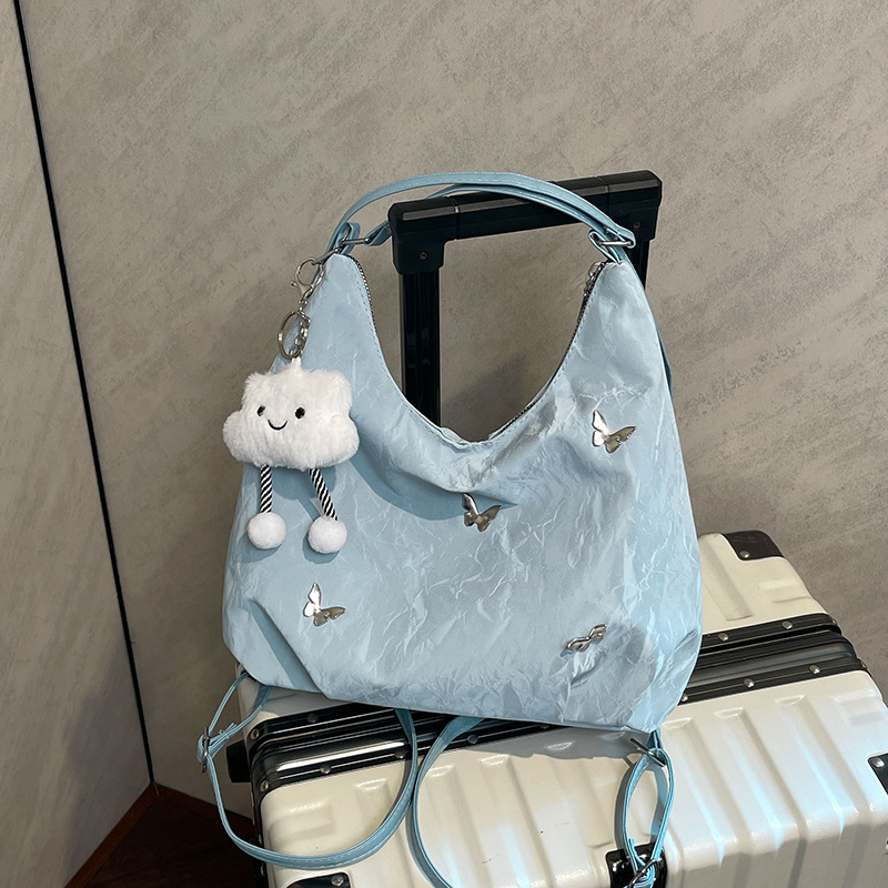 Large capacity commuting backpack women 2026 early autumn new butterfly underarm single shoulder bag tote bag