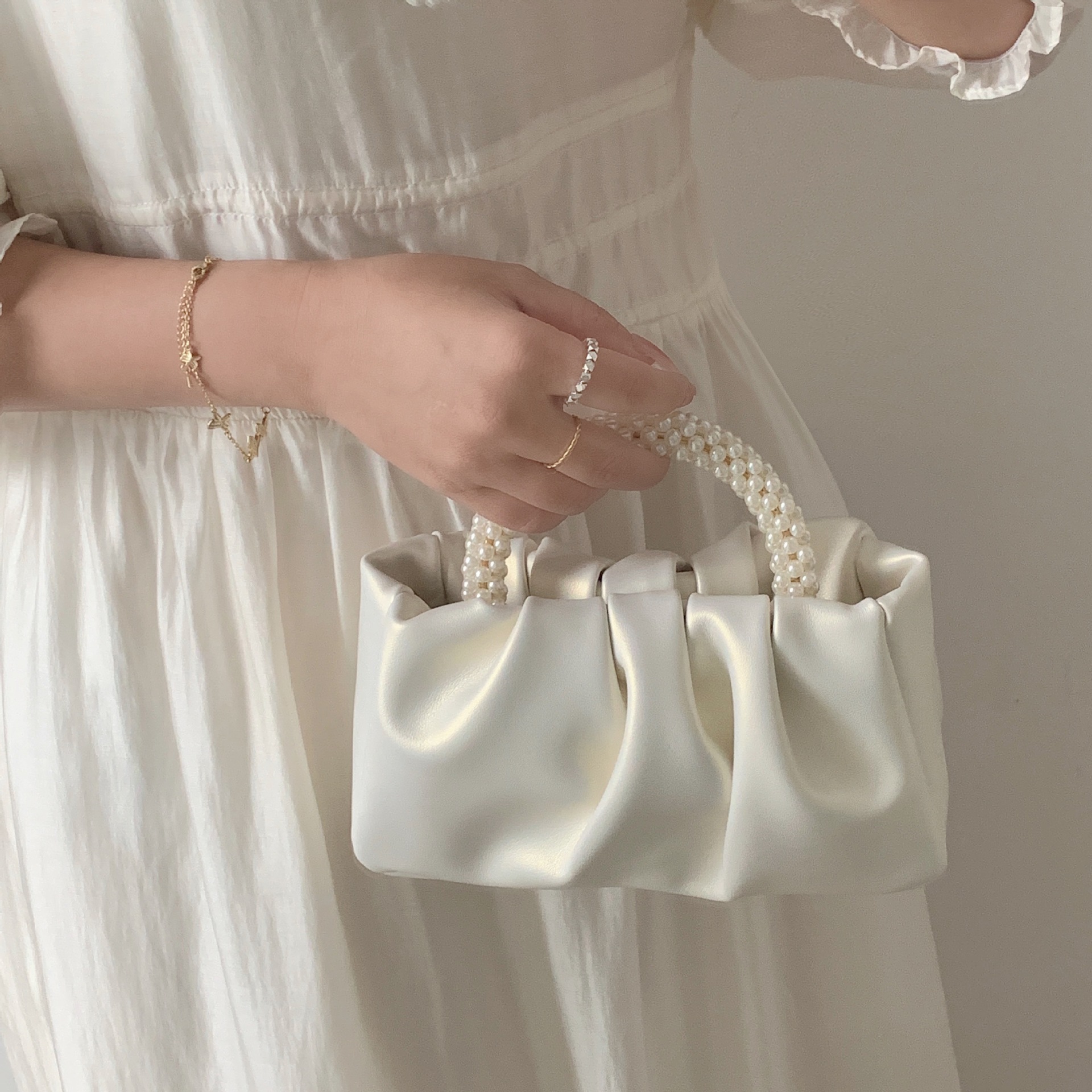 2026 new women's bag pearl wrist pleated cloud handbag shoulder crossbody mini bag