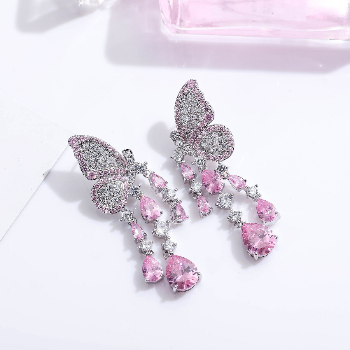 Korean micro-set zircon colored pink butterfly wing tassel drop goddess earring stud banquet annual meeting full diamond earring silver needle