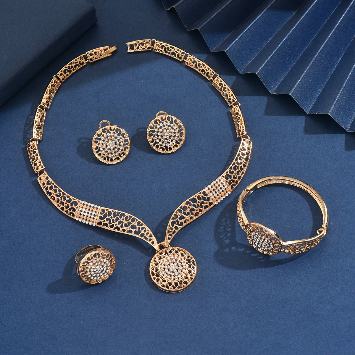 Gold Alloy Hollow Necklace Earrings Bracelet Ring Four-Piece Wedding Banquet Accessories