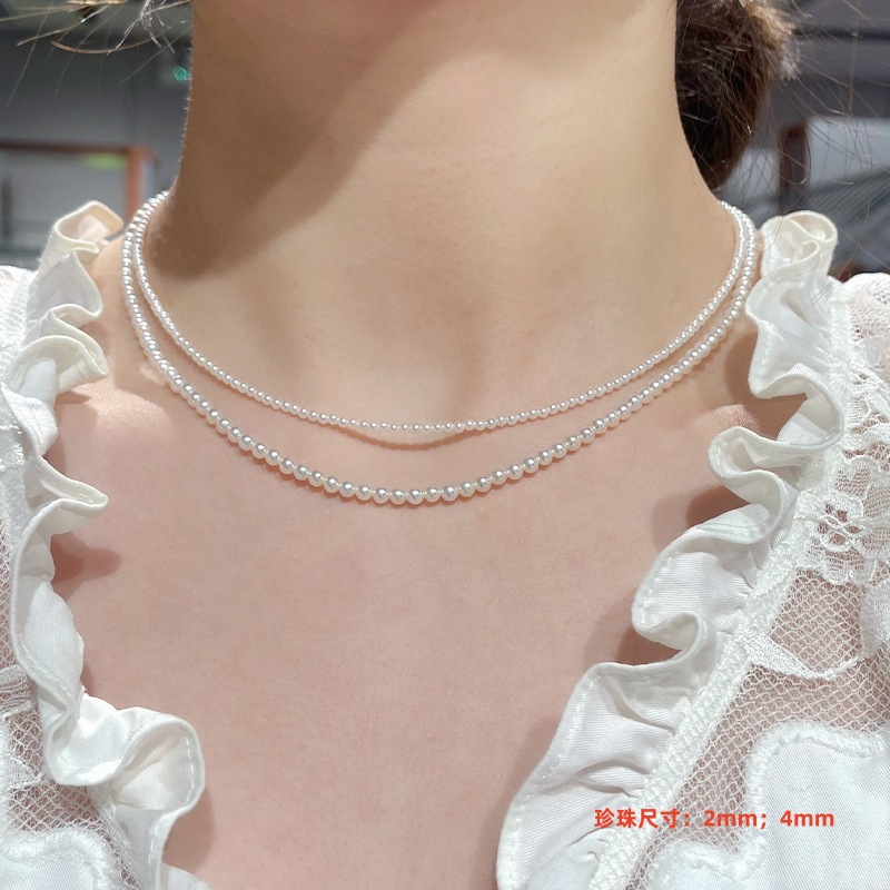 Round high-gloss pearl necklace for women elegant 2026 autumn winter new yuanbao buckle silver accessories