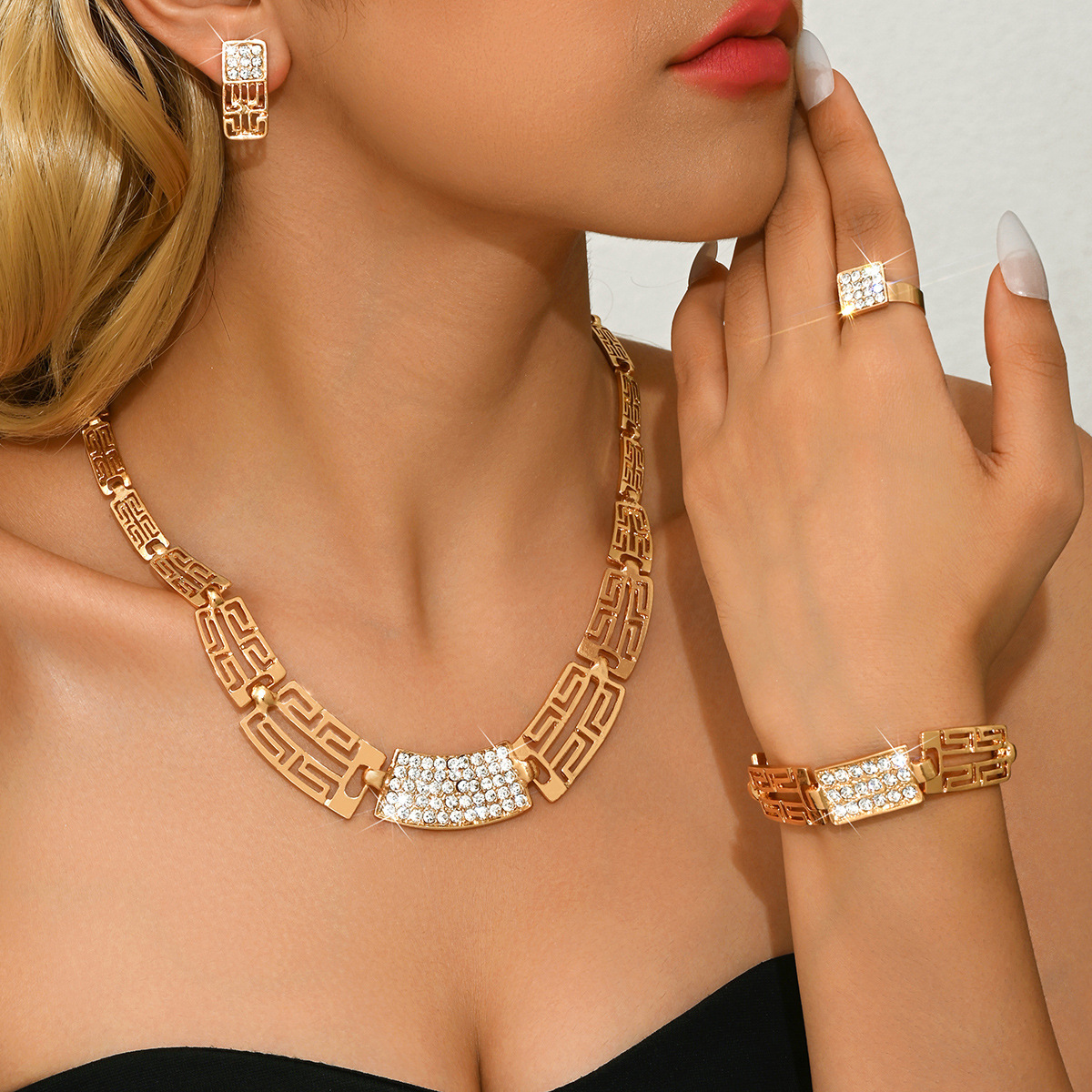 Gold Alloy Hollow Necklace Earrings Bracelet Ring Four-Piece Wedding Banquet Accessories