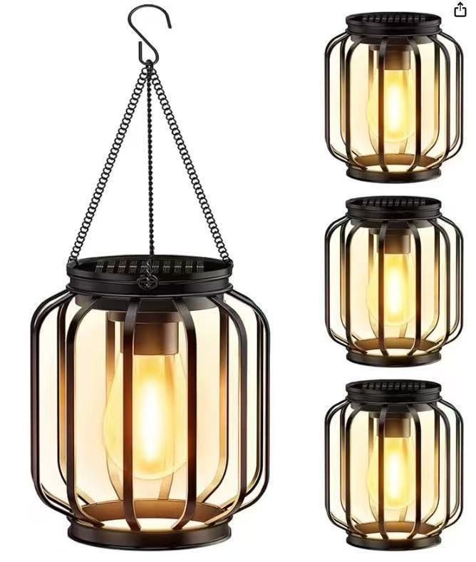 2026 new solar outdoor courtyard lamp iron lantern outdoor hollow waterproof garden landscape decoration