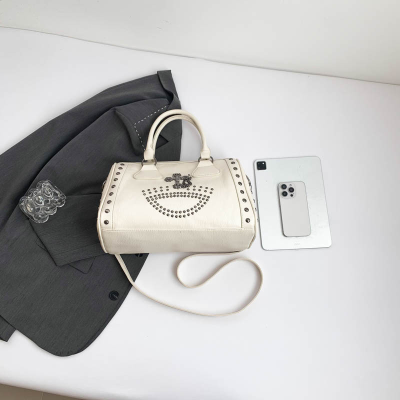 Large Capacity Punk Style Commuter Boston Cylinder Handheld Bag for Women Niche Rivet Shoulder Bag