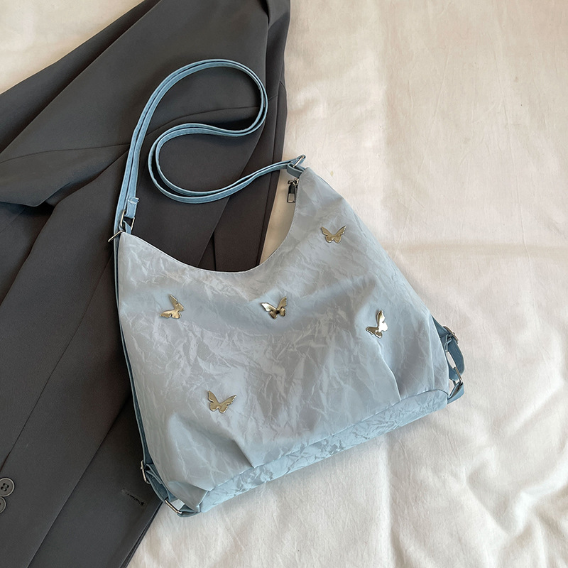 Large capacity commuting backpack women 2026 early autumn new butterfly underarm single shoulder bag tote bag