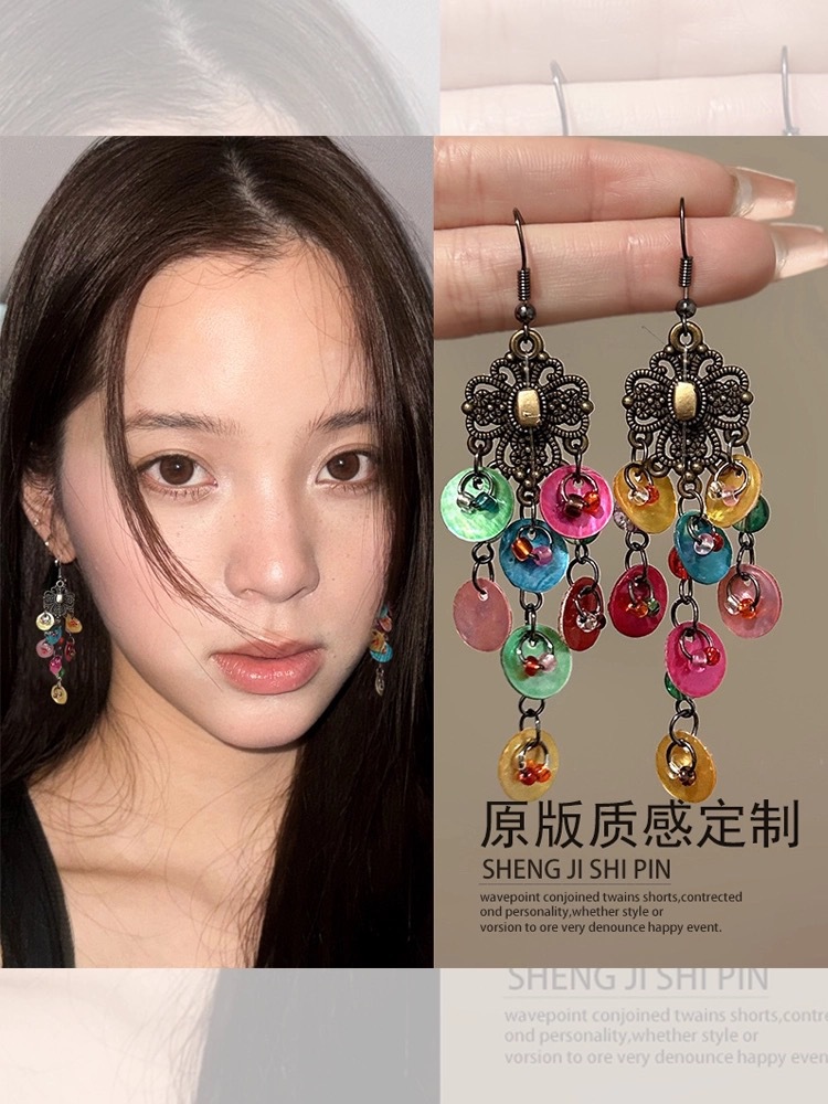 Ethnic style red bead tassel Bohemian earrings Yunnan travel resort style ear cuff feather ear accessories
