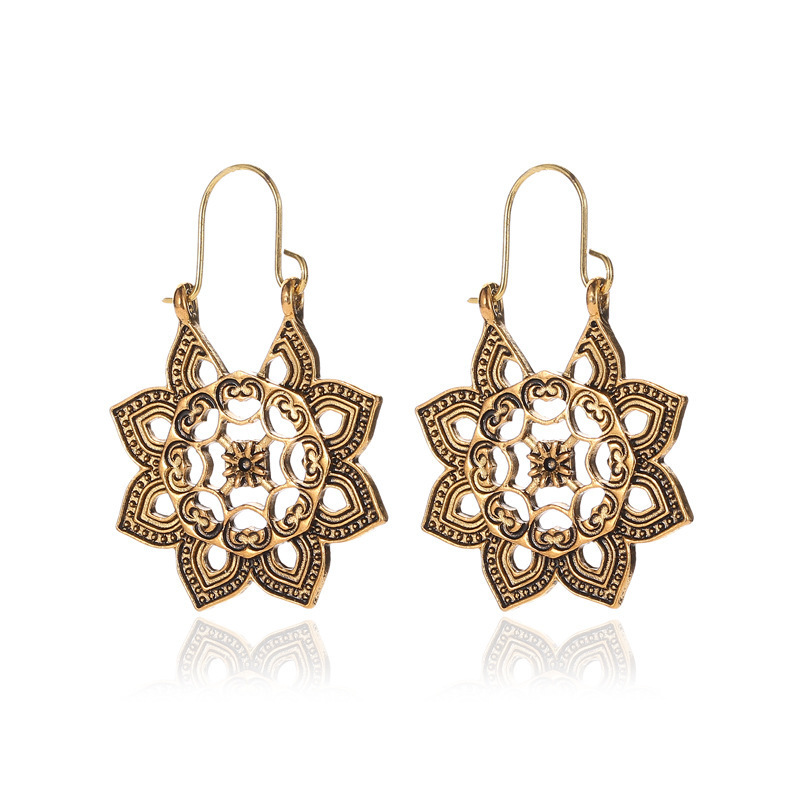 Ethnic Style Earrings Exotic Flavor Metal Hollow Flower Earrings Bohemian Carved Palace Style Ear Drops