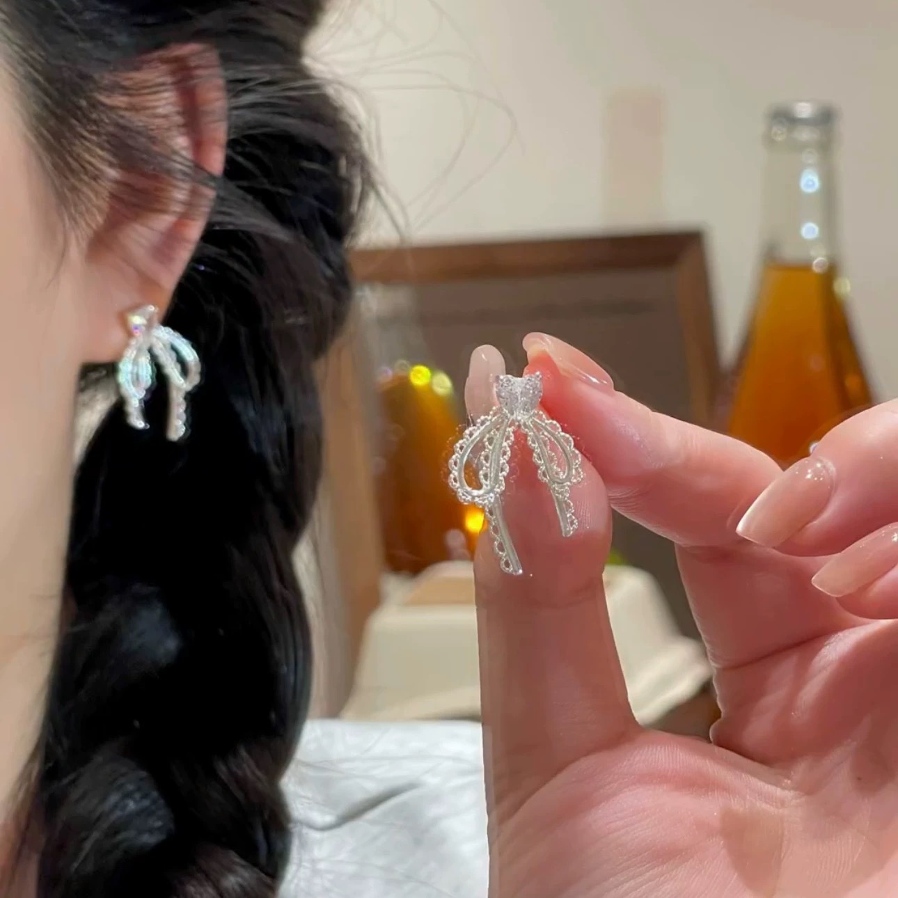 74#透明爱心水钻蕾丝蝴蝶结耳钉