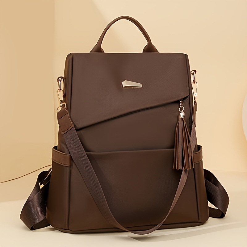 Simple double-shoulder backpack women 2026 new student large capacity soft leather schoolbag casual backpack
