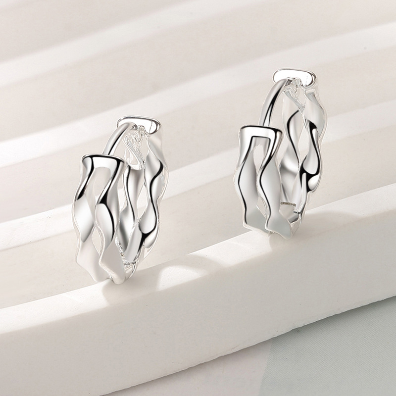 Hollow Mobius silver earrings, simple new twisted gold earrings