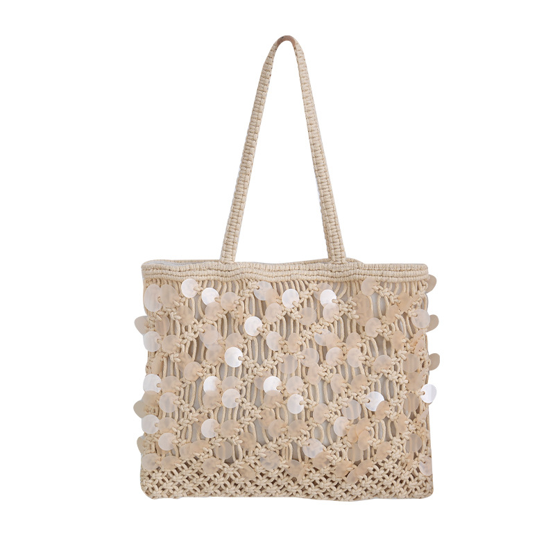 New vacation style shell piece woven beige tote bag, large capacity hollow woven shoulder bag