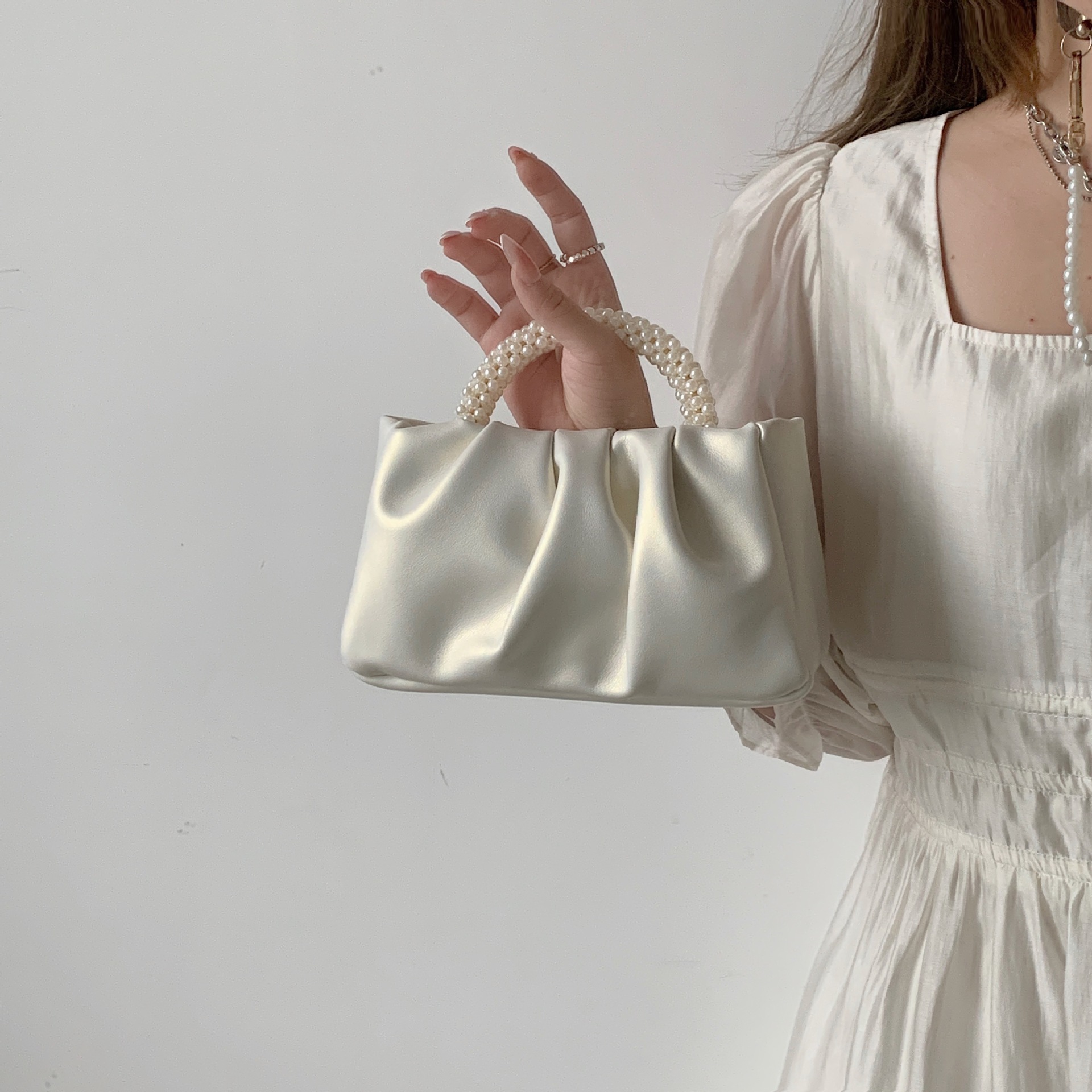2026 new women's bag pearl wrist pleated cloud handbag shoulder crossbody mini bag