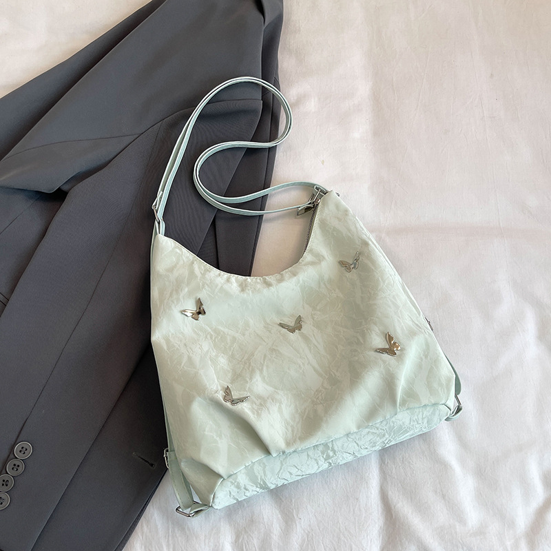 Large capacity commuting backpack women 2026 early autumn new butterfly underarm single shoulder bag tote bag
