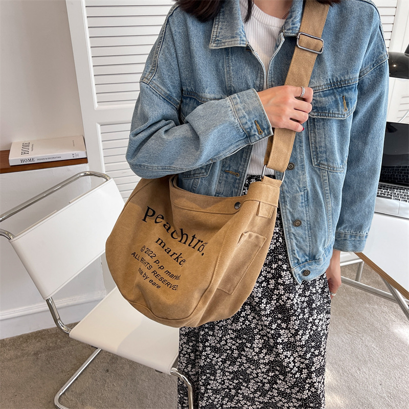 Letter canvas bag women's 2022 new tote bag student class crossbody bag large capacity single shoulder bag