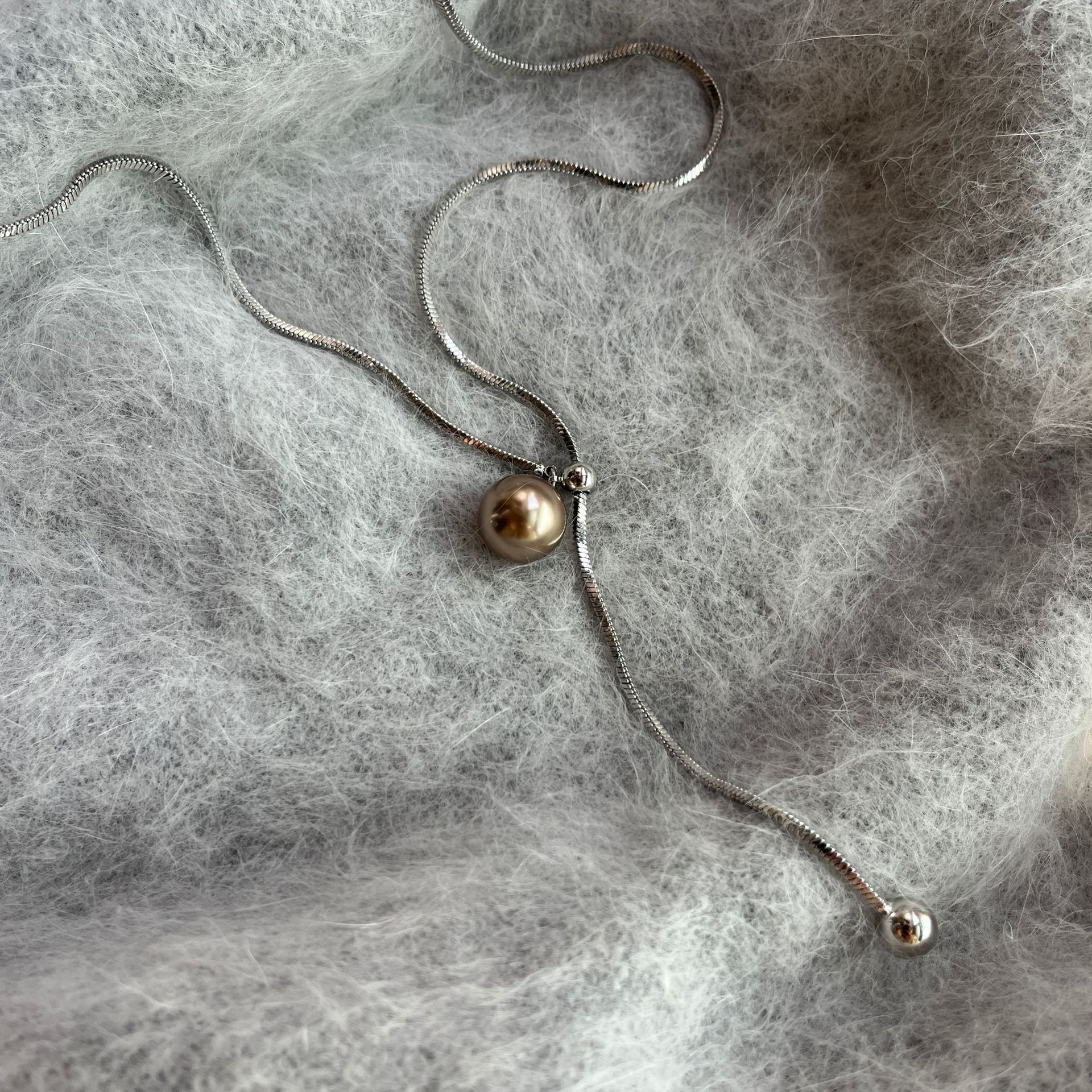 Three-color pearl necklace pull adjustable long alloy snake bone simple sweater chain