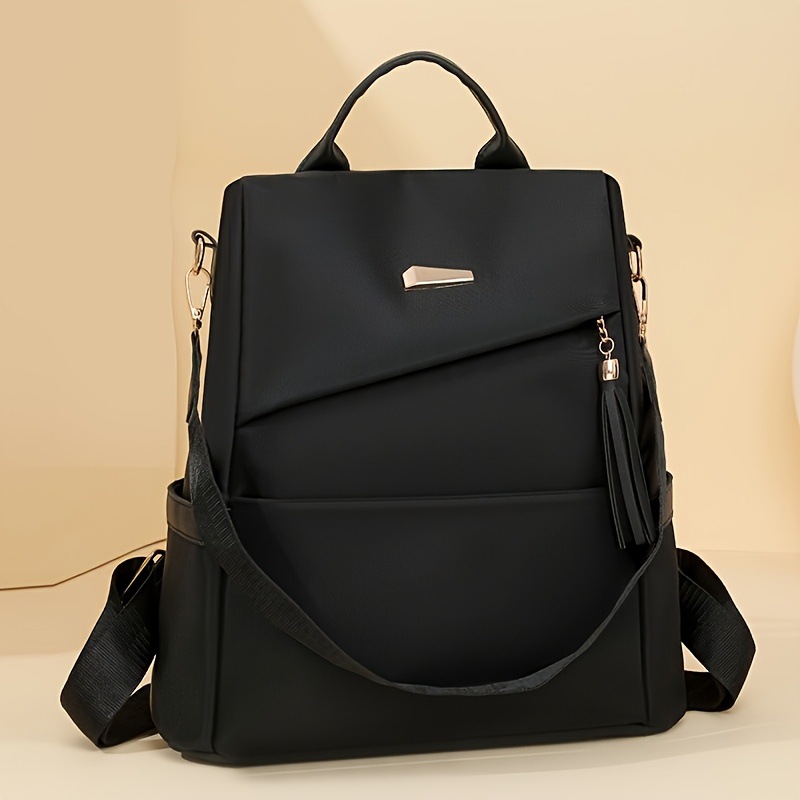 Simple double-shoulder backpack women 2026 new student large capacity soft leather schoolbag casual backpack