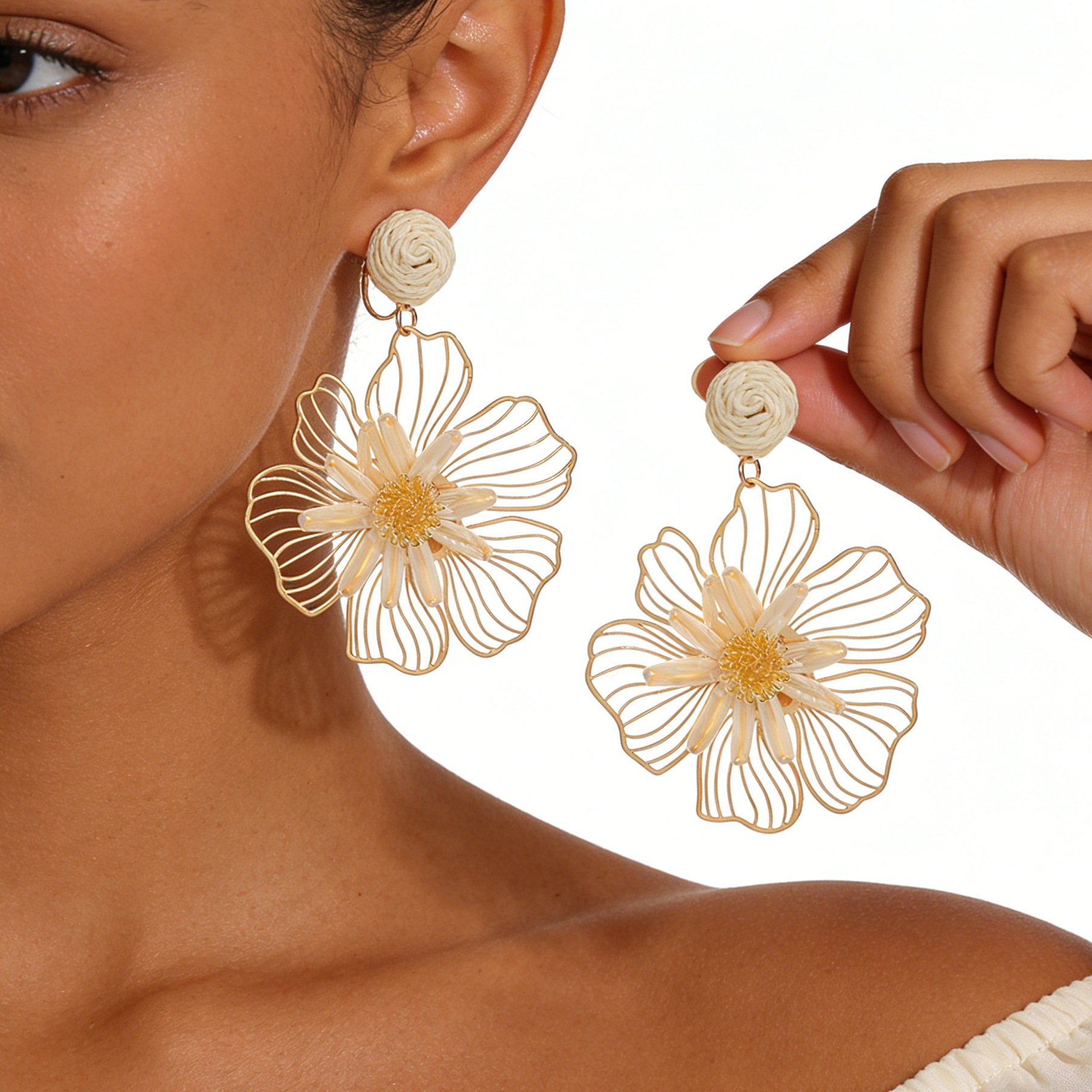 2026 spring summer raffia handmade woven hollow three-dimensional flower earrings for women beach vacation style