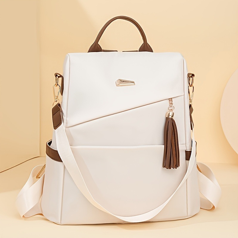 Simple double-shoulder backpack women 2026 new student large capacity soft leather schoolbag casual backpack