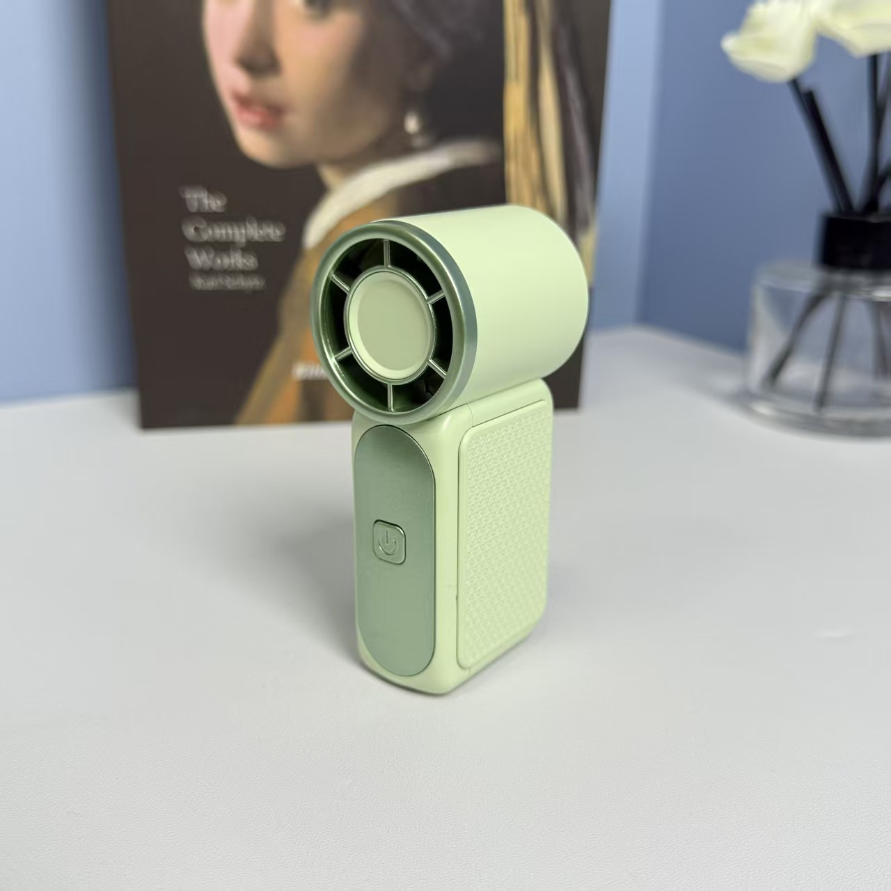 X699 mini handheld fan rechargeable pocket fan high wind small portable high-speed small cannon turbo brushless