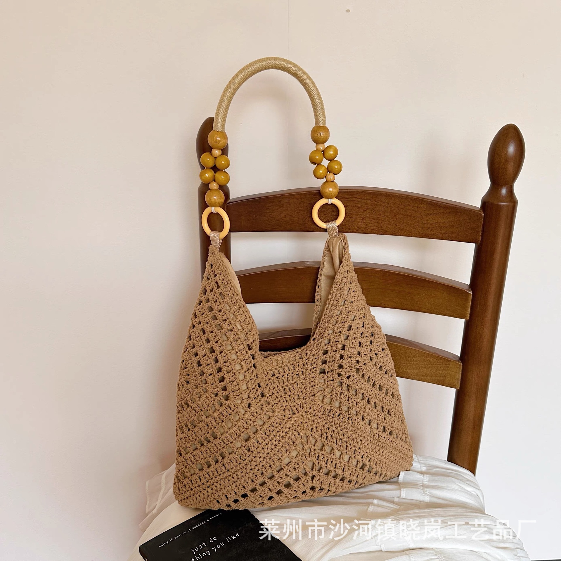 Summer seaside beach bag women's 2026 new large capacity hollow woven shoulder bag handbag tote bucket bag