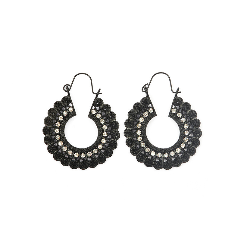 Ethnic Style Earrings Exotic Flavor Metal Hollow Flower Earrings Bohemian Carved Palace Style Ear Drops