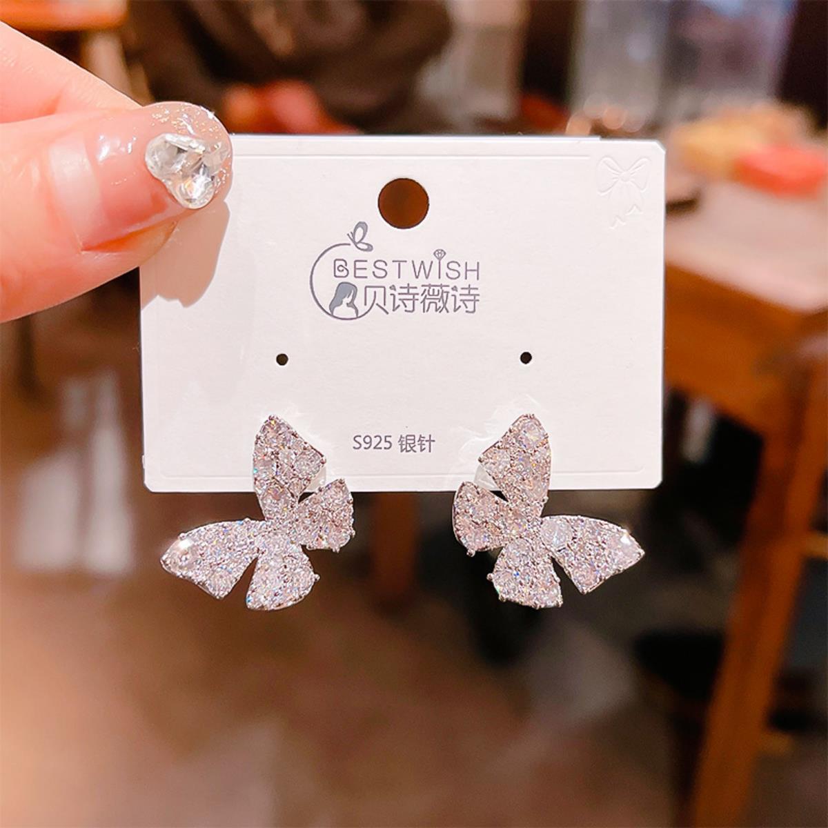 2025 exquisite gold-plated simple super flash zircon earrings, women's fairy butterfly flower ear accessories
